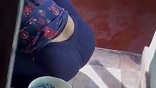 Uncle's Girlfriend washing clothes