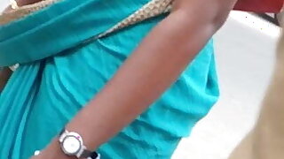 Madurai tamil girl, side boobs and navel in saree in public