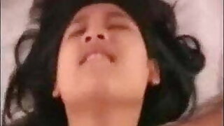 Masturbating